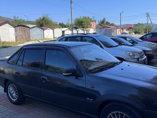 2009 Daewoo Nexia I Рестайлинг, чёрный, 200000 рублей, вид 2