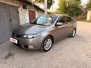2012 Kia Cerato 6-speed II, серебристый, 1400000 рублей, вид 1