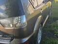 2012 Mitsubishi Outlander II Рестайлинг, коричневый - вид 3