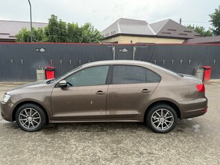 2011 Volkswagen Jetta VI, коричневый, 900000 рублей, вид 4