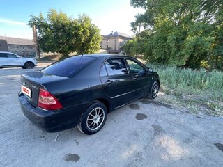2006 Toyota Corolla IX (E120, E130) Рестайлинг, чёрный, 380000 рублей, вид 3