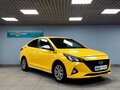 2021 Hyundai Solaris II Рестайлинг, жёлтый - вид 2
