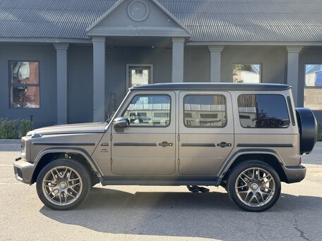 2025 Mercedes-Benz G-Класс AMG 63 AMG II (W465) Рестайлинг, золотистый, 29490000 рублей, вид 2