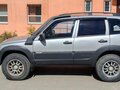 2015 Chevrolet Niva I Рестайлинг, серебристый, 570000 рублей - вид 2