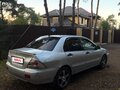 2006 Mitsubishi Lancer IX Рестайлинг, серебристый - вид 3