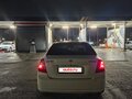 2015 Daewoo Gentra II, жёлтый - вид 3