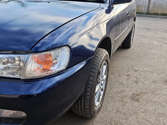 1999 Toyota Corolla VII (E100), синий - вид 3