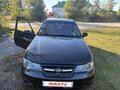 2012 Daewoo Nexia I Рестайлинг, чёрный, 180000 рублей