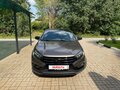 2024 Lada (ВАЗ) Vesta I Рестайлинг (NG), коричневый, 1460000 рублей - вид 2