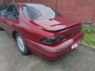 1993 Pontiac Bonneville IX, пурпурный, 255000 рублей, вид 3