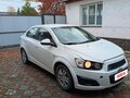 2012 Chevrolet Aveo II, белый, 515000 рублей