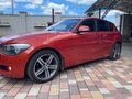 2012 BMW 1 серии 116i II (F20/F21), оранжевый, 990000 рублей