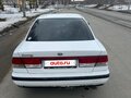 1999 Nissan Sunny B15, белый - вид 1