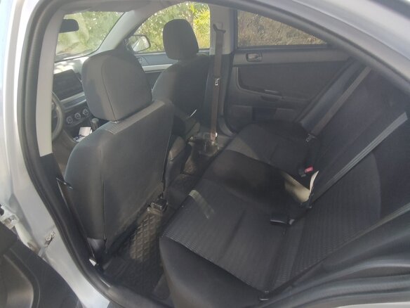 2012 Mitsubishi Lancer X Рестайлинг, серый, 820000 рублей - вид 4