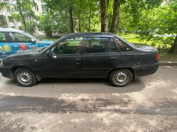 2011 Daewoo Nexia I Рестайлинг, чёрный, 150000 рублей - вид 1