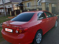 2008 Toyota Corolla X (E140, E150), красный, 650000 рублей - вид 6