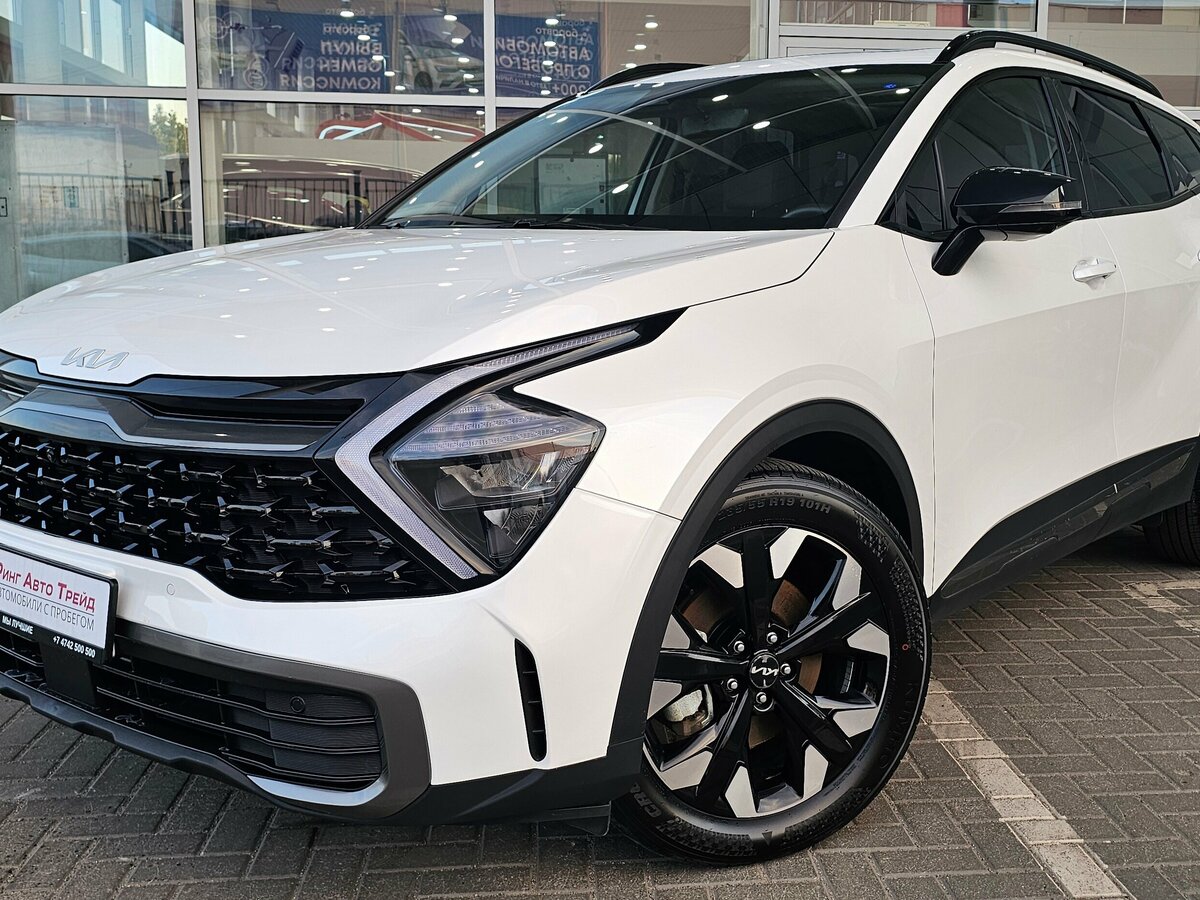 Открыть фотографии: Kia Sportage V