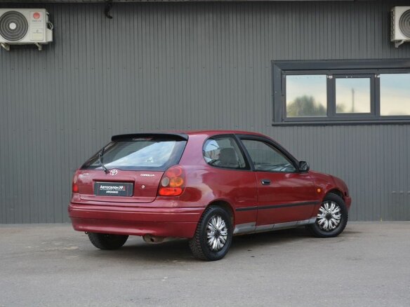 1998 Toyota Corolla VIII (E110), красный, 149888 рублей - вид 5