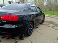 2011 Volkswagen Jetta VI, чёрный, 1100000 рублей - вид 2