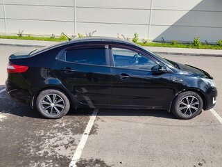 2012 Kia Rio 4-speed III, чёрный, 749000 рублей, вид 3