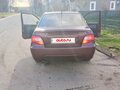2009 Daewoo Nexia I Рестайлинг, пурпурный, 160000 рублей - вид 5
