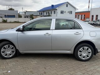 2012 Toyota Corolla X (E140, E150) Рестайлинг, серебристый, 950000 рублей, вид 4