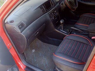 2003 Toyota Corolla Runx IX (E120, E130), красный, 670000 рублей, вид 5