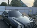 1996 Mercedes-Benz E-Класс 230 II (W210, S210), чёрный - вид 3