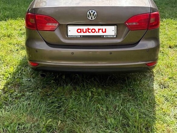 2012 Volkswagen Jetta VI, коричневый, 920000 рублей - вид 2