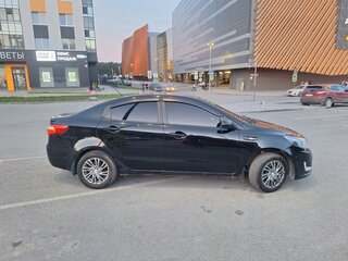 2012 Kia Rio 5-speed III, чёрный, 780000 рублей, вид 2