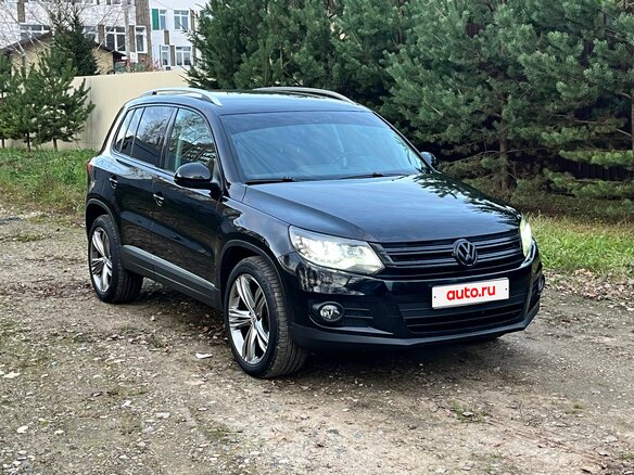 2011 Volkswagen Tiguan I Рестайлинг, чёрный, 1550000 рублей - вид 1