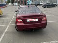2012 Daewoo Nexia I Рестайлинг, пурпурный, 110000 рублей - вид 1