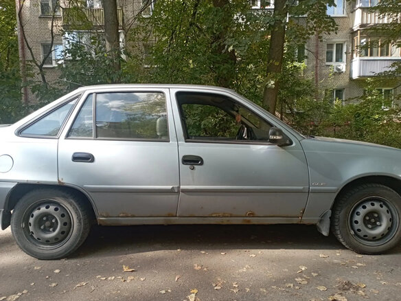 2012 Daewoo Nexia I Рестайлинг, серебристый - вид 2