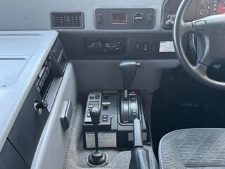 1999 Toyota Mega Cruiser, белый, 2590000 рублей, вид 5