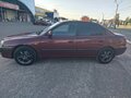 2010 Hyundai Elantra ТагАЗ III (XD2) Рестайлинг, красный - вид 1