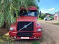 2002 Volvo VNL, красный, 3300000 рублей - вид 1