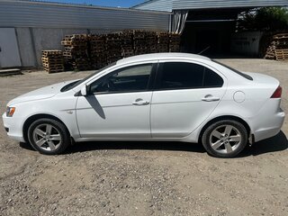 2008 Mitsubishi Lancer X, белый, 700000 рублей, вид 2