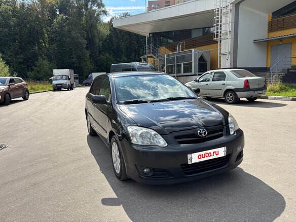 2004 Toyota Corolla IX (E120, E130) Рестайлинг, чёрный - вид 1