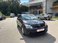 2004 Toyota Corolla IX (E120, E130) Рестайлинг, чёрный - вид 1
