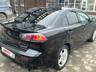 2011 Mitsubishi Lancer X Рестайлинг, чёрный, 620000 рублей, вид 3