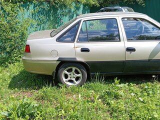 2012 Daewoo Nexia I Рестайлинг, жёлтый, 200000 рублей, вид 2