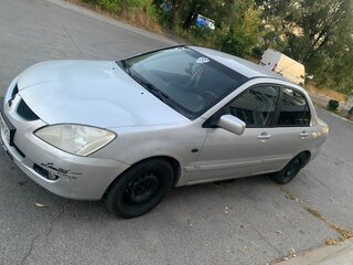 2004 Mitsubishi Lancer IX, серебристый, 335000 рублей, вид 1