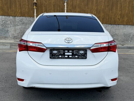 2014 Toyota Corolla XI (E160, E170, E180), белый, 1100000 рублей, вид 5
