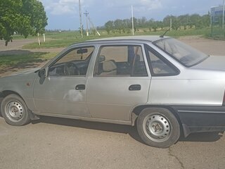 2006 Daewoo Nexia I, серебристый, 180000 рублей, вид 4