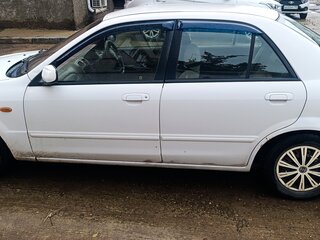 2002 Mazda Familia VIII (BJ), белый, 260000 рублей, вид 3