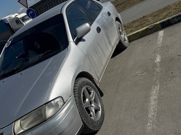 1997 Mazda Familia VII (BH), серебристый, 105000 рублей - вид 6