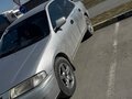 1997 Mazda Familia VII (BH), серебристый, 105000 рублей - вид 6