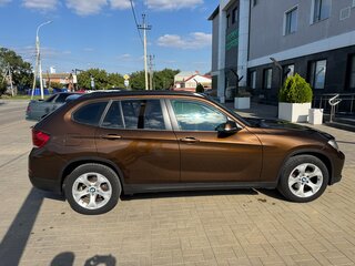 2014 BMW X1 18i I (E84) Рестайлинг, коричневый, 1390000 рублей, вид 4