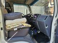 2014 Isuzu Elf (N-series), белый - вид 6