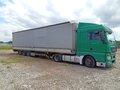 2018 MAN TGX, зелёный, 3300000 рублей - вид 2